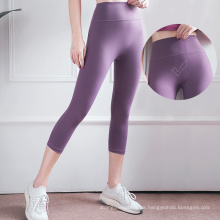 Hochtütig nahtloses Yoga -Leggings Training Sporthosen Fitness No Show Vier Wege Dehnungs -Capri -Leggings